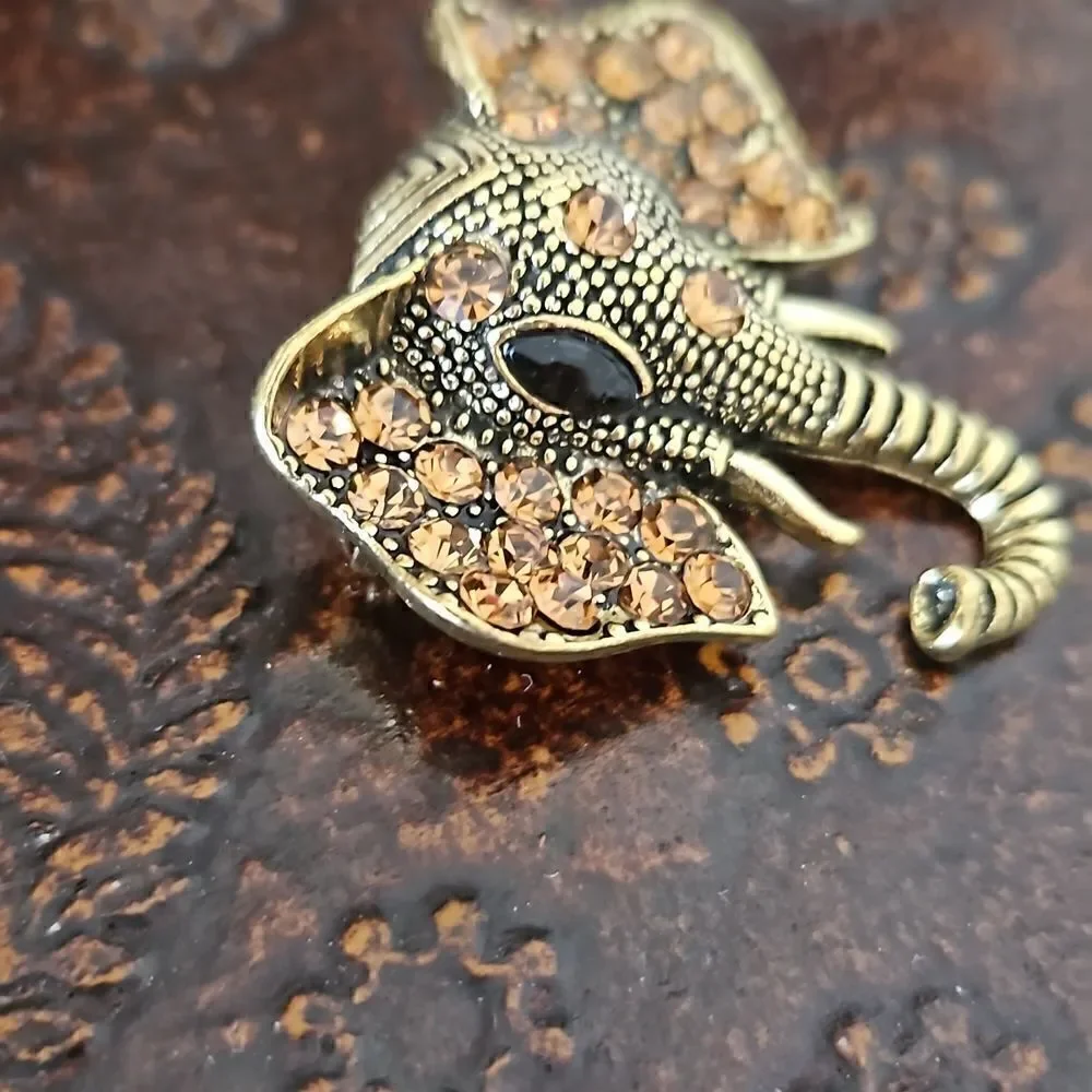 NWOT Gold tone crystal elephant brooch.